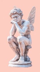 Obraz premium A contemplative statue of a winged figure, embodying introspection and artistry.