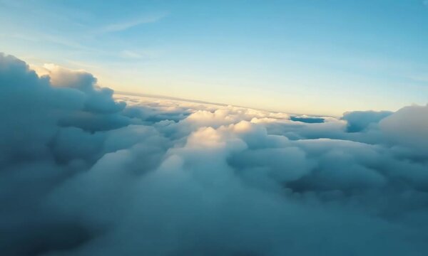 4K aerial footage of flying through the sky with sunlight streaming through fluffy clouds, creating a serene and beautiful flying above the bright blue sky landscape. 