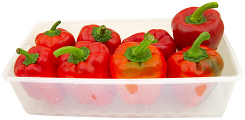 Red bell peppers in a plastic box