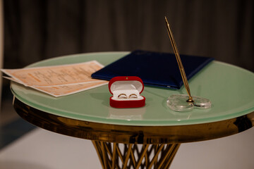 Elegant Wedding Setup Featuring Rings and Documents
