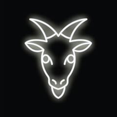 Neon sign of a funny goat sticking out its tongue on a black background