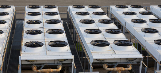 View on rows of block of industrial air conditioning units for buildings and large facilities....