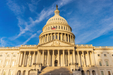 Obraz premium The exterior of the US Capitol Building which houses the Senate and the House of Representatives in Washington DC.