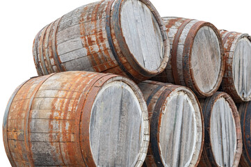 Old wooden barrels on a white