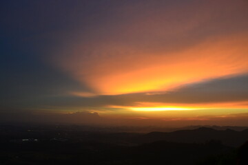 A sunset over the mountains