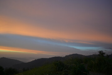 Seamless blue orange sunset sky over mountain