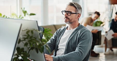 Computer, system and web developer with man programmer in office for coding or design. Creative,...