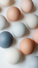 Pastel Colored Eggs on White Background - Minimalist Food Photography