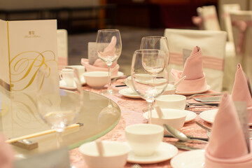 a table with a table with a table set for a wedding reception