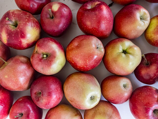 Background of red ripe juicy apples. Organic Apples grown in the home garden