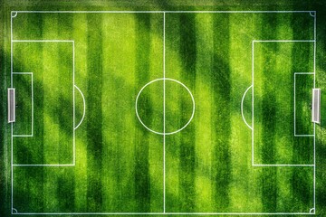 Aerial view of an empty soccer field, vibrant green grass, white lines, and goals.