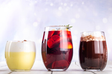 Hot drink cafes menu background, with mulled wine, eggnog and hot chocolate traditional Christmas winter cocktails and beverages, with Christmas New Year festive holiday decorations, copy space