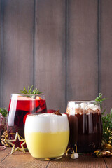 Hot drink cafes menu background, with mulled wine, eggnog and hot chocolate traditional Christmas winter cocktails and beverages, with Christmas New Year festive holiday decorations, copy space