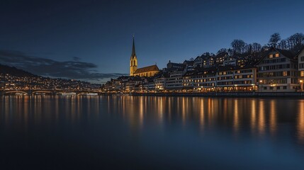 Fototapeta premium Enchanting Nighttime Cityscape of Zurich s Old Town with Church Steeples and the Tranquil River Reflecting the Warm Glow of Illumination