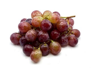 Sweet red grapes isolated on a white background. Fresh fruit with alot of vitamin C