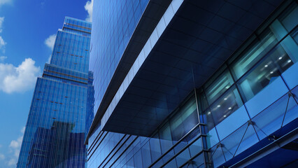 Modern Urban Skyline with Reflective Glass Buildings and Blue Sky