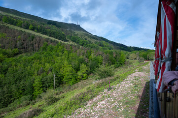 Travelling by old wooden train up to Larrun or La Rhune, Larhune mountain at the western end of the Pyrenees located on border of France and Spain, in traditional Basque provinces Labourd and Navarra