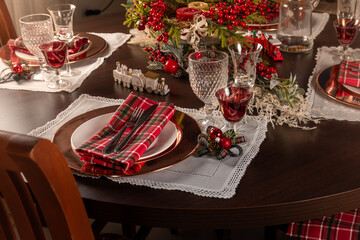 Elegant Christmas Table Setting with Red and Cooper Accents