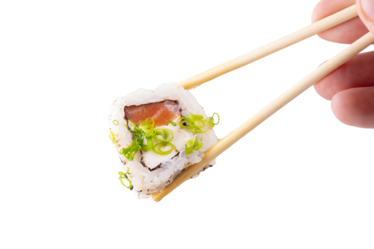 one piece raw salmon sushi with cream cheese held by chopsticks isolated