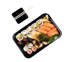 oriental sushi combo tray raw fish healthy japanese colorful exotic delivery with soy sauce and chopsticks top view