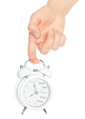 Woman hand holds white Alarm Clock, isolated on transparent background, time and home things concept