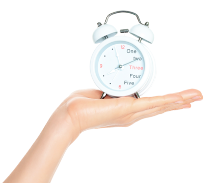 Woman hand holds white Alarm Clock, isolated on transparent background, time and home things concept