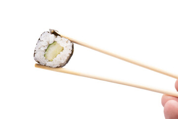 vegan sushi of cucumber rice and seaweed just held by chopsticks isolated