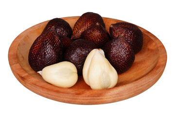 A group of snake fruits on a woven container isolated transparent