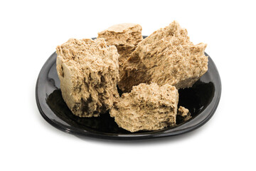 Pieces of halva on a saucer