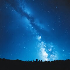 Obraz premium Night sky cityscape with the Milky Way galaxy.