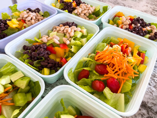 Meal Prep with Colorful Salads in Containers