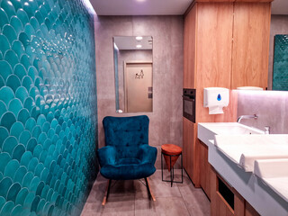 modern interior design public toilets for mothers and babies in shopping malls. baby care room