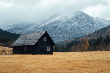 Obraz premium Rustic Wooden Cabin Nestled in Mountain Valley Landscape