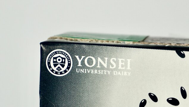 Jakarta, Indonesia - November 21th, 2024 - Yonsei University Dairy logo on drink beverage box packaging isolated on horizontal white background.