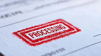 Close up of document featuring bold red PROCESSING stamp, symbolizing ongoing administrative tasks and workflows. textured paper adds depth to image
