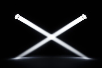 Crossed white spotlights on dark stage