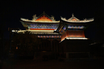 Fototapeta premium Illuminated Chinese temple at night