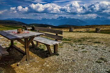 Scenic mountain view with picnic table.