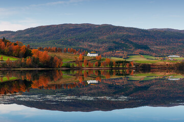 Fototapeta premium Norwegian landscape with hills and small coastal villages