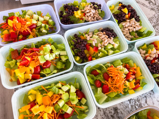 Meal Prep with Colorful Salads in Containers