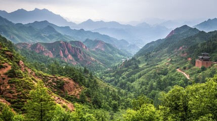 Naklejka premium Breathtaking Mountain Landscape with Rolling Green Hills, Red Rock Formations, and Serene Valleys Under a Cloudy Sky in a Natural Wilderness