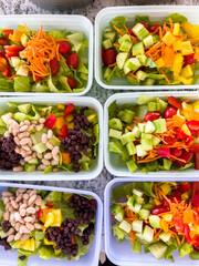 Meal Prep with Colorful Salads in Containers