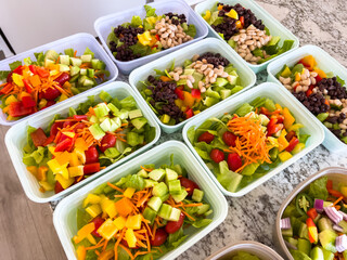 Meal Prep with Colorful Salads in Containers