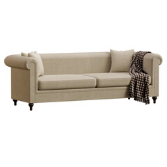 A tan couch with a brown blanket draped over it