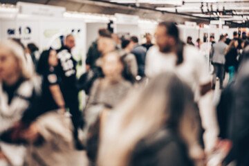 Abstract blurred people at exhibition hall of expo event trade show. Business convention show or...
