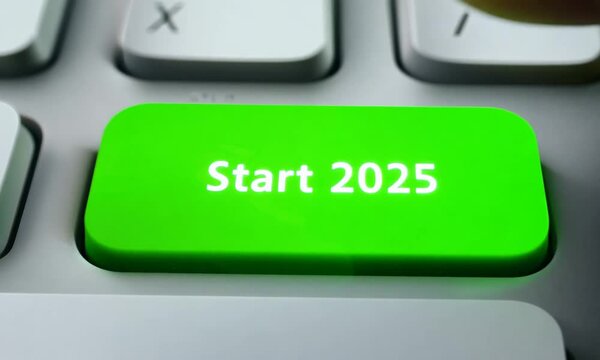 Closeup of a green keyboard button labeled Start 2025 being pressed. New Year concept
