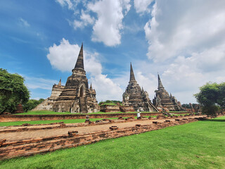 Wat Phra Si Sanphet Chedi and Wihan Ruins. The temple is graced by the landmark three bell-shaped...