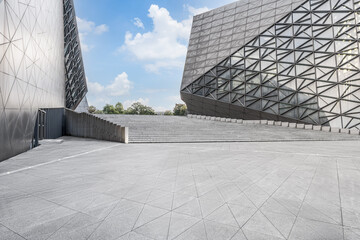 Empty brick floor and modern city buildings background
