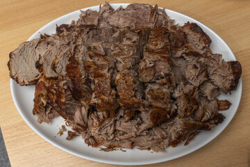 Pork neck meat cooked in the oven