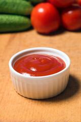 Bowl of tomato sauce in the kitchen close-up